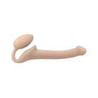 Close up of flesh toy with long tail from Strap-On-Me Strapless Silicone Non-Vibrating Strap on