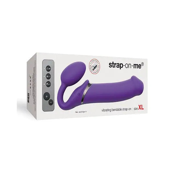 Close up of Purple Strap-On-Me Vibrating Rechargeable Strapless Strap On in a box