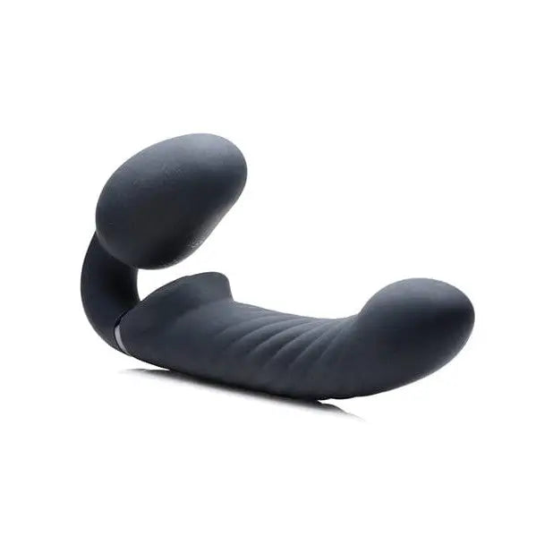 Black object on the ground - Strap U Ergo-Fit Twist Inflatable Vibrating Strapless Strap-on