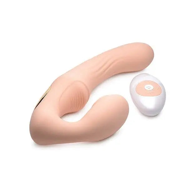 Strap U U-Pulse Silicone Strapless Strap On with Remote on white surface