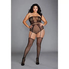 Woman in strapless teddy bodystocking with attached garters and stockings, black high heels