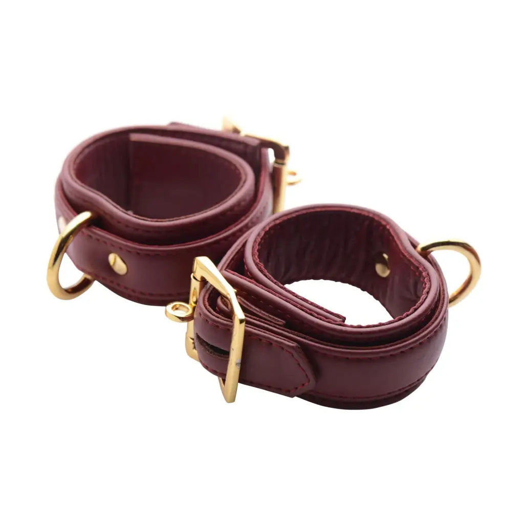 Strict Leather Luxury Locking Wrist Cuffs: leather cuffs with gold hardware for secure fit