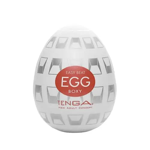 Tenga Egg Boxy: White egg-shaped object with rectangular openings and ‘EASY BEAT EGG BOXY TENGA’ label