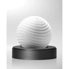 Tenga Geo Aqua in White: Elegant white ice cream design on sleek black stand