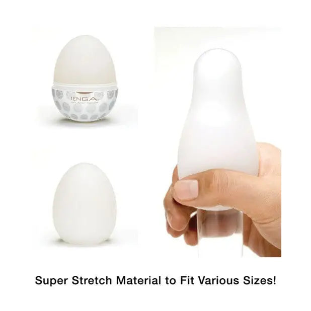 Hand holding Tenga Hard Gel Egg with ’super’ text on a white egg