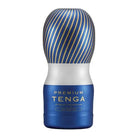 TENGA Premium Air Flow CUP - Disposable Masturbation Sleeve next to a perfume bottle