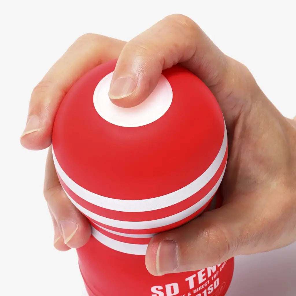 Red and white striped stress ball labeled ’SD TENN’ with Tenga SD Original Vacuum Cup