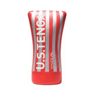 Tenga Soft Tube Cup Ultra Size alongside a bottle of red and white paint