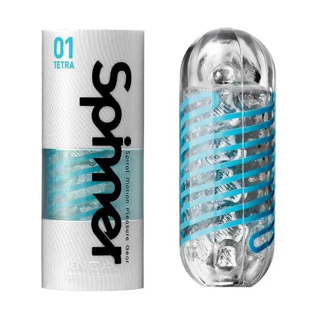 Close up of TENGA Spinner 01 TETRA rotating reusable masturbation sleeve with bottle and tube