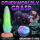 Glow-in-the-dark octopus-inspired silicone dildo with suction cup base from Creature Cocks