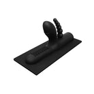 Black plastic desk organizer with handle next to Buckwild silicone attachment for double penetration