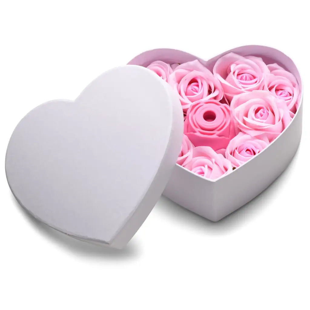 A heart-shaped box filled with pink roses with a magnetic charging base for our Rose Lovers Gift Box