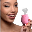 Woman holding pink lip brush from The Rose Lovers Gift Box 10x Clit Suction Rose with magnetic charging