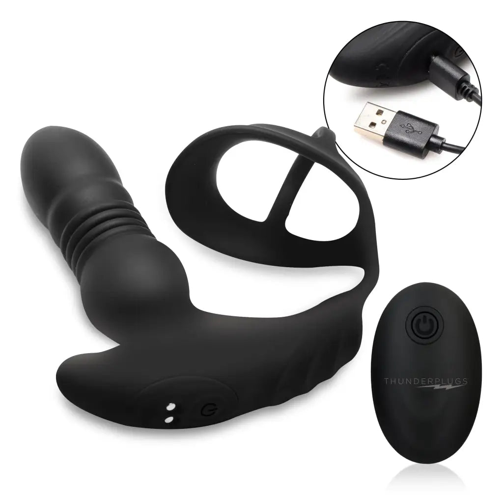 Black silicone thrusting vibrator with cock ring, remote control, and USB charging cable