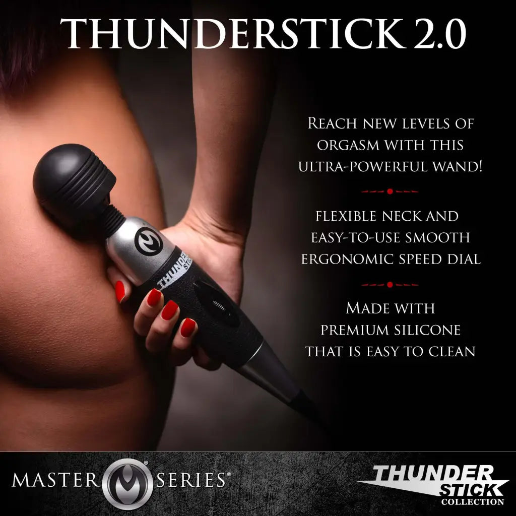 A woman using a tattoo gun with a black background, featuring the Thunderstick 2.0 Super Charged Power Wand