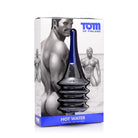 Black and blue ribbed glass bottle labeled ’Tom of Finland Hot Water’ in enema delivery system