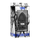 Tom Of Finland medium silicone anal plug with stylized male figures in packaging