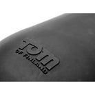 Embossed ’Tom of Finland’ logo on leather, featured with Tom’s Inflatable Silicone Dildo