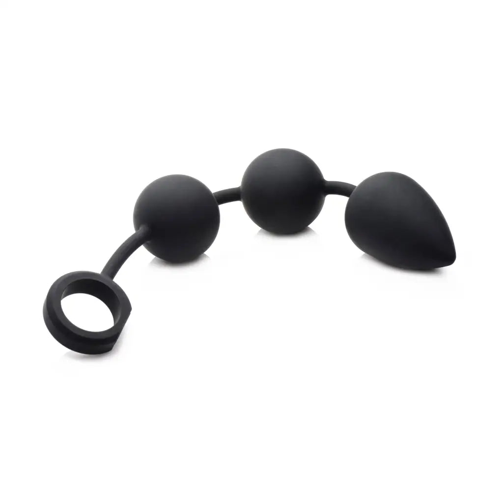 A pair of black Tom Of Finland Weighted Anal Ball Beads for enhanced pleasure