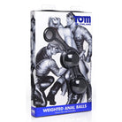 Packaging for Tom Of Finland Weighted Anal Balls with stylized muscular male illustrations