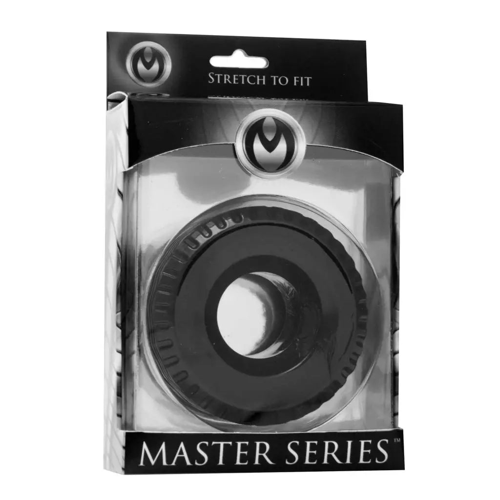 Close-up black and white photo of Tread Ultimate Tire Cock Ring from master series