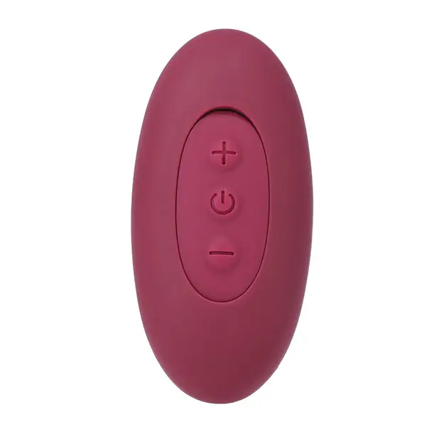 Tryst Duet W/Remote: Pink plastic egg with a small face