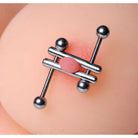 Twin Screws Nipple Press: Metallic nipple piercing with 4 spherical ends and 3 connecting bars