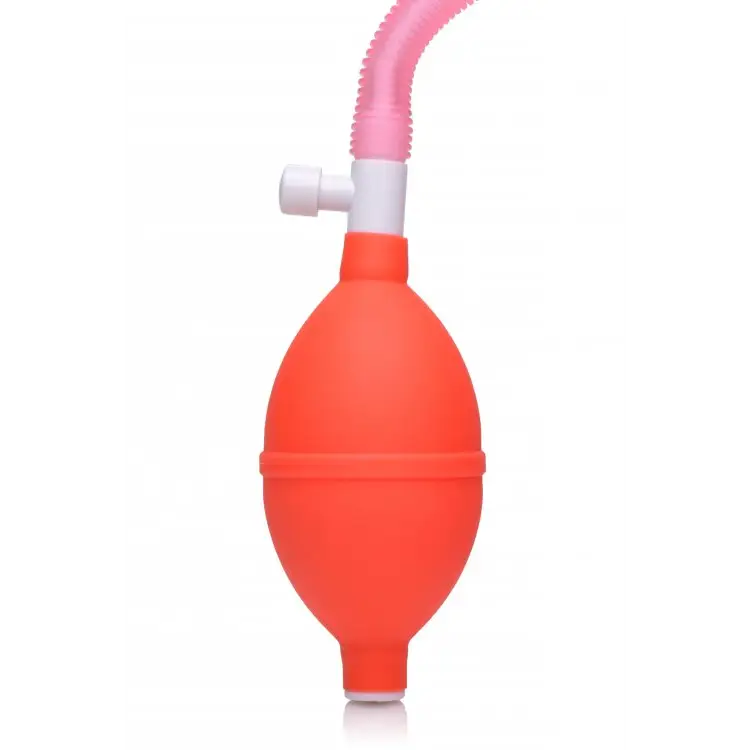 Vaginal pump with red rubber bulb syringe and pink flexible tube attached. Perfect for feminine care