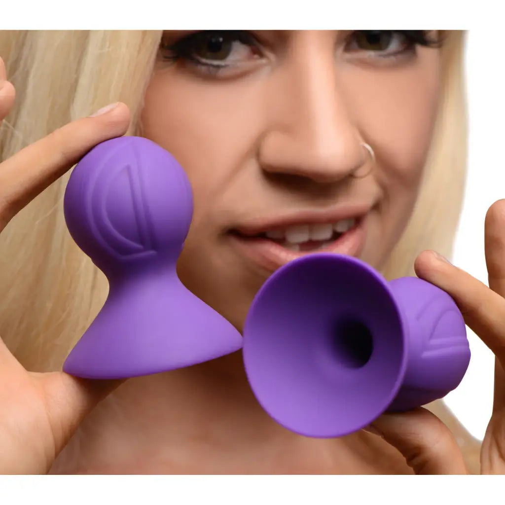 Purple silicone nipple suckers shaped like suctions; Violets Silicone Nipple Suckers