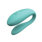 Close-up of We-Vibe Sync Lite blue plastic object with curved handle and single button