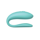 We-Vibe Sync Lite: Light blue silicone vibrating device with single button and curved design