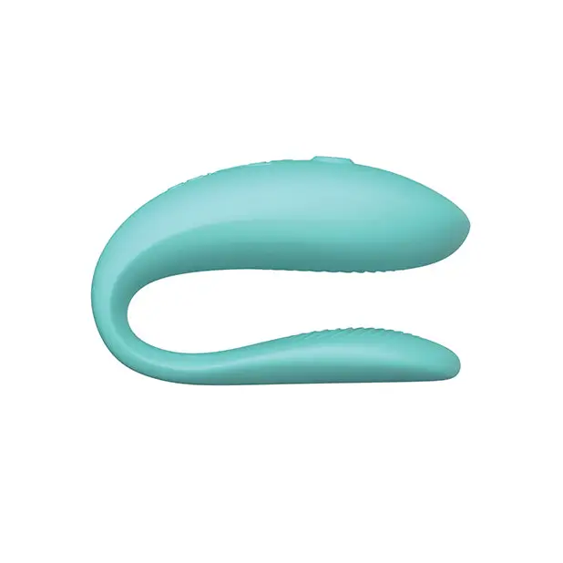 We-Vibe Sync Lite: Light blue silicone vibrating device with single button and curved design