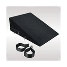 Black wedge-shaped Whip Smart Try-Angle Cushion with straps for versatile support and comfort