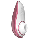 Womanizer LIBERTY Air Clitoral Stimulator with pink and white baby pac for intensity levels