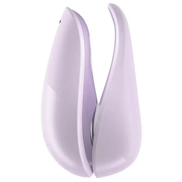 Purple plastic vases showcased with Womanizer LIBERTY Air Clitoral Stimulator for unique appeal