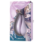 The city perfume box with Womanizer LIBERTY Air Clitoral Stimulator displayed alongside