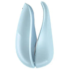 Blue vase with curved design next to Womanizer LIBERTY Air Clitoral Stimulant with intensity levels