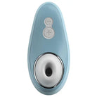 Close-up of Womanizer Liberty Air with blue door handle and white knob for intensity levels