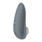 Womanizer STARLET 3 on white surface, featuring pleasure air technology and intensity levels