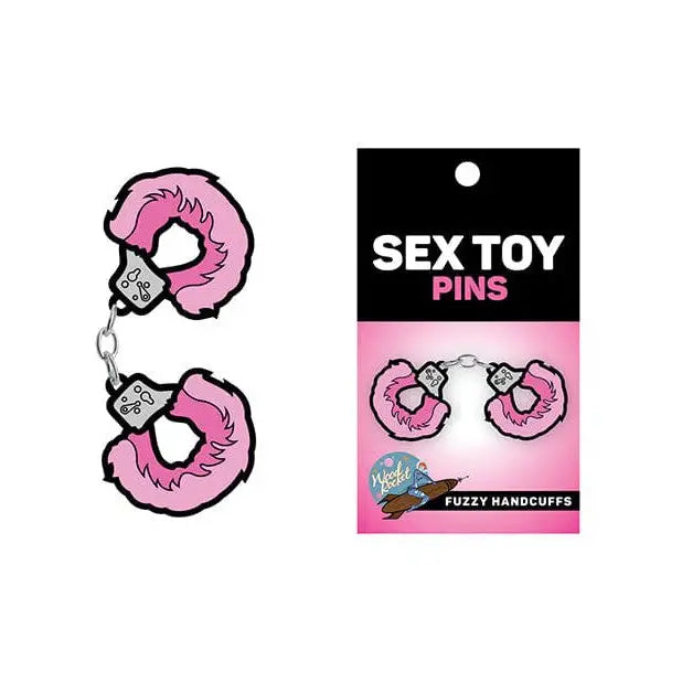 Fuzzy pink handcuffs enamel pin set by Wood Rocket, perfect as sex toy-themed accessories