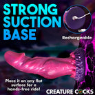 Pink phallic silicone dildo with curved shaft and suction cup base for use with water based lubricants