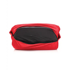 Red toiletry bag with black interior, zipper closure, and water resistant, soft outer layer