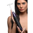 Handheld electronic massager with pronged metal attachment in Zeus Deluxe Edition Twilight kit